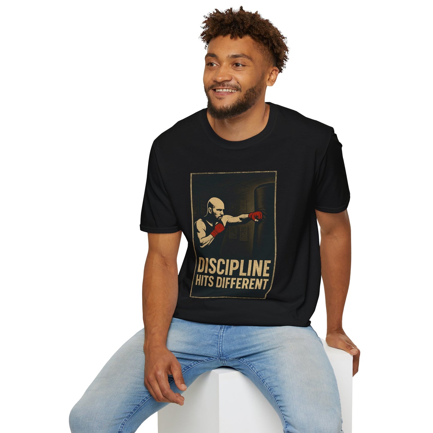 Motivational Unisex Softstyle T-Shirt - 'Discipline Hits Different' - with a Jab